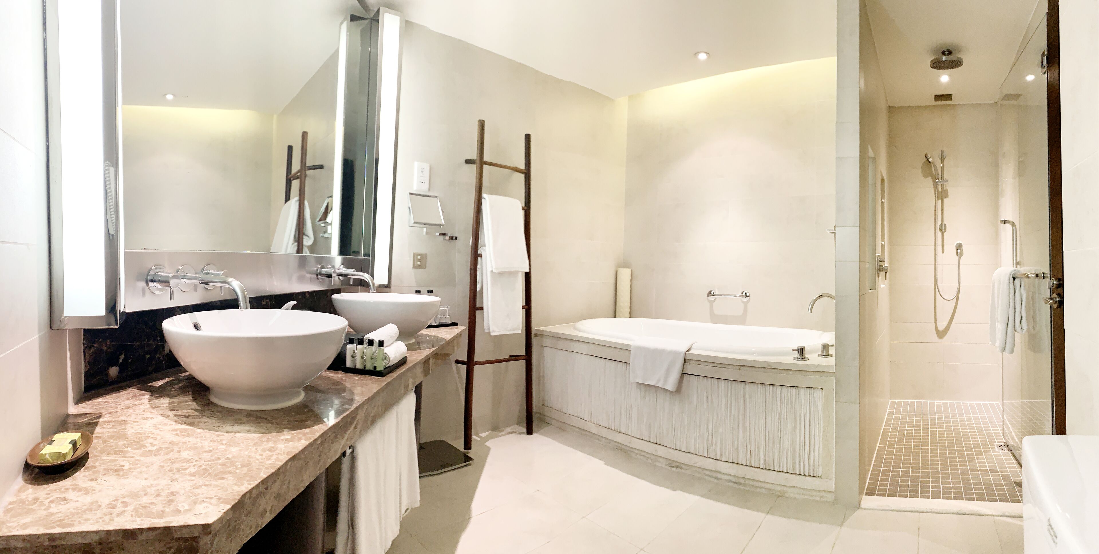 deep-soaking bathtub, rainfall showerhead, free toiletries, hair dryer