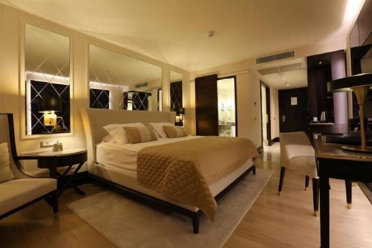Roupas de cama premium, frigobar, cofres nos quartos