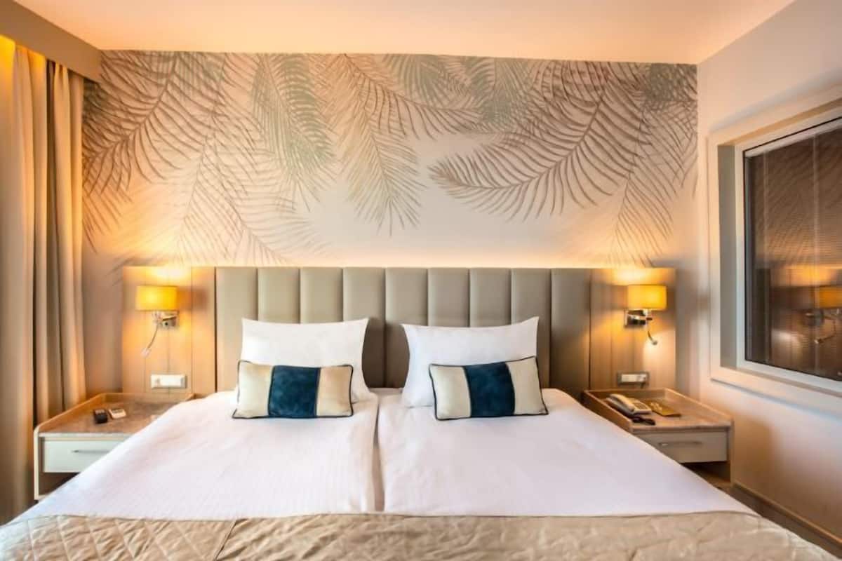 2 Schlafzimmer, hochwertige Bettwaren, Minibar, Zimmersafe