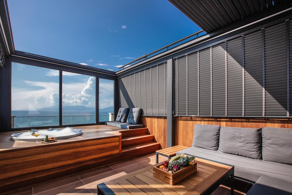 Exclusive Suite, 1 Bedroom, Hot Tub, Sea View | 2 bedrooms, premium bedding, minibar, in-room safe