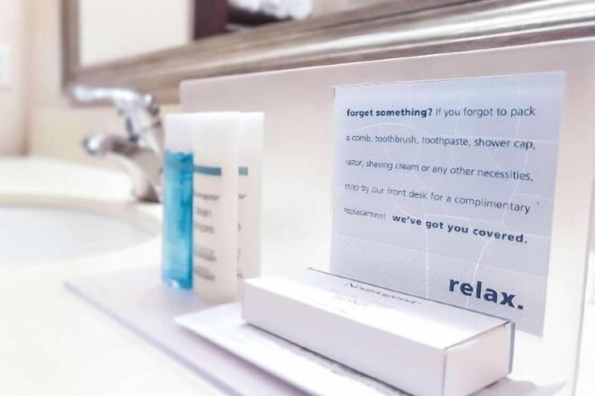 Bathroom amenities | Bathtub, hair dryer, towels