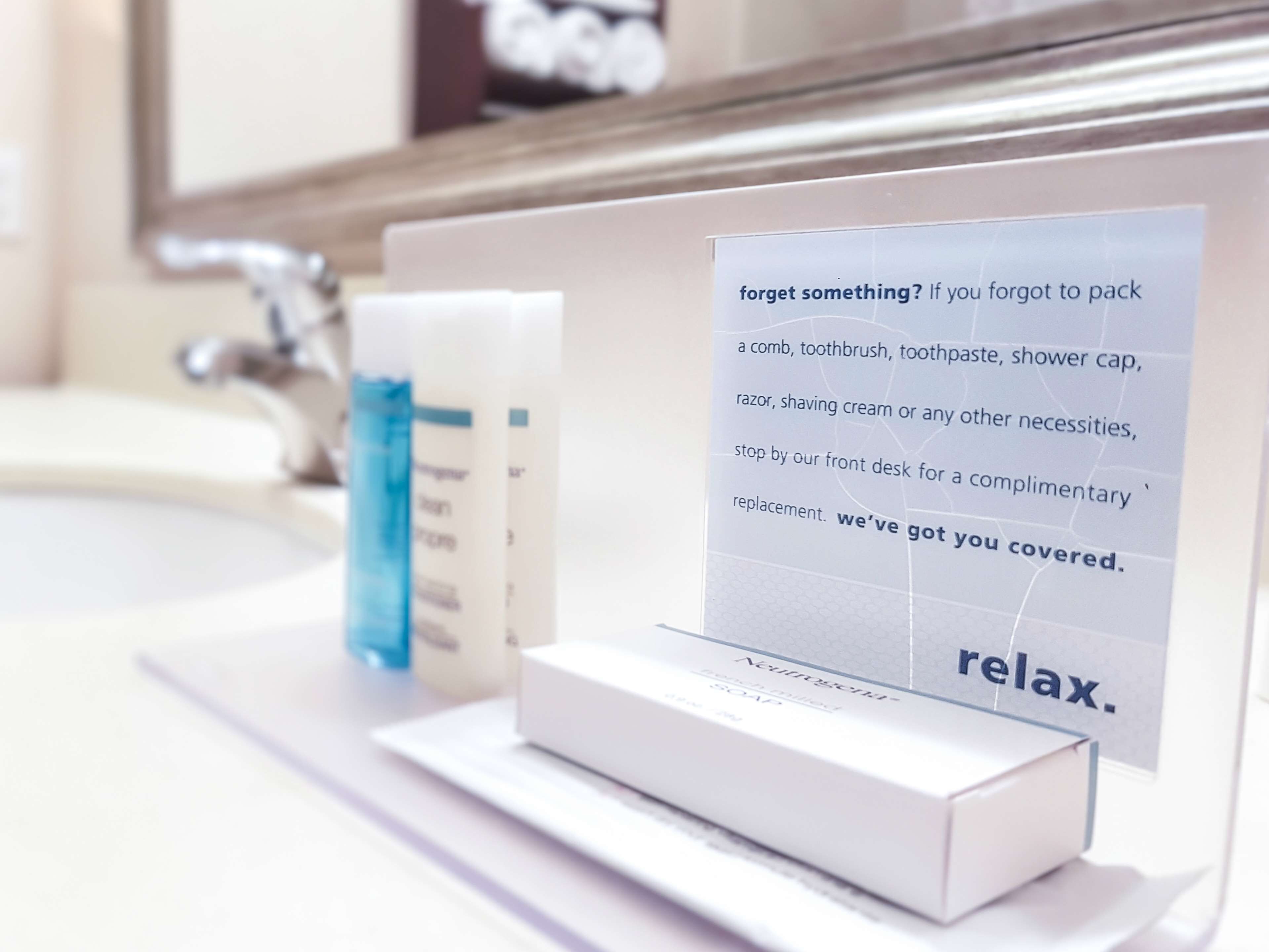 bathtub, hair dryer, towels