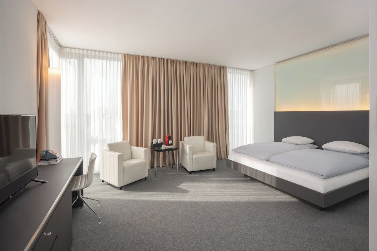 Premium bedding, down duvets, Select Comfort beds, free minibar items