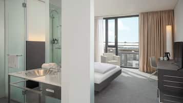 The Innside Room | Premium bedding, down comforters, Select Comfort beds, minibar