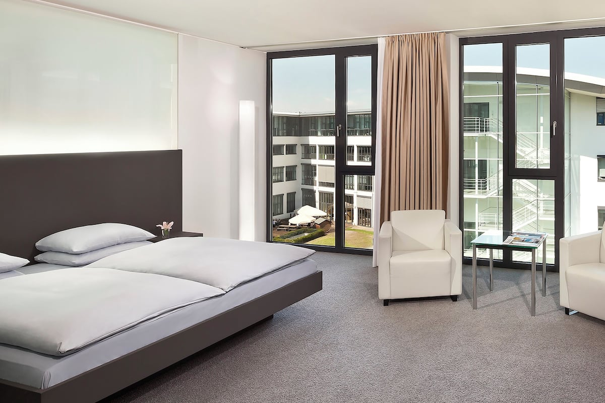 Premium bedding, down duvets, Select Comfort beds, free minibar items