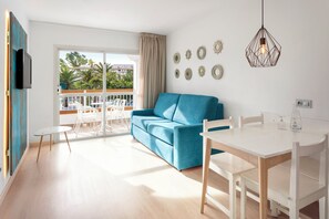 One Bedroom Apartment Pool View | Living area | Flat-screen TV - Aparthotel Alcudia Garden (Alcúdia)