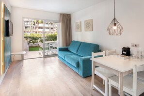 Premium One Bedroom Apartment Private Garden | Living area | Flat-screen TV - Aparthotel Alcudia Garden (Alcúdia)