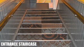 An entrance staircase with patterned steps and metal railings. - Princess Hostel Amsterdam (Amsterdam)