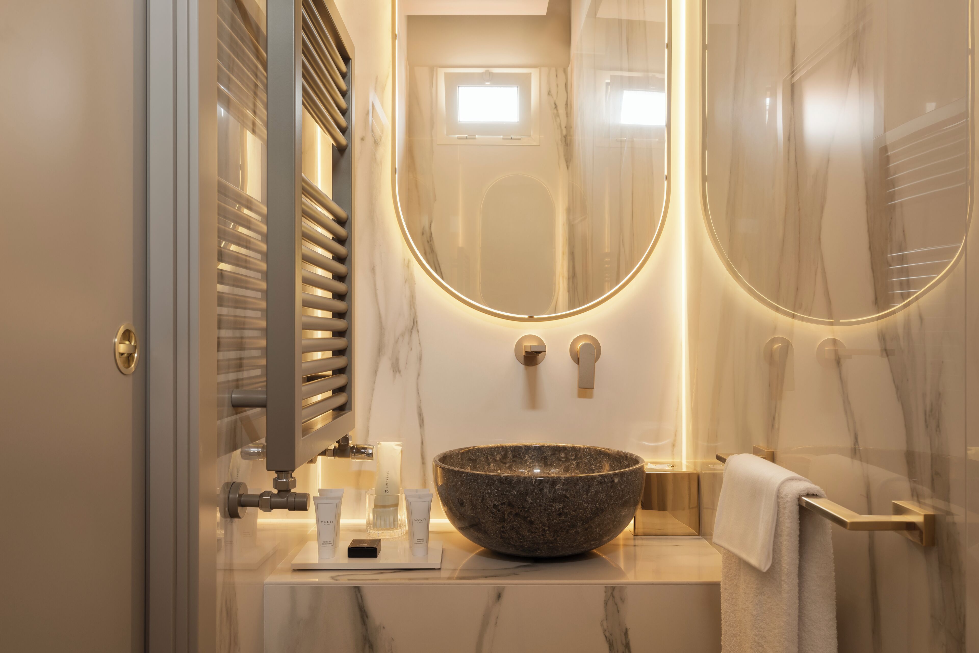 deluxe suite | bathroom | shower, designer toiletries, hair dryer, bathrobes