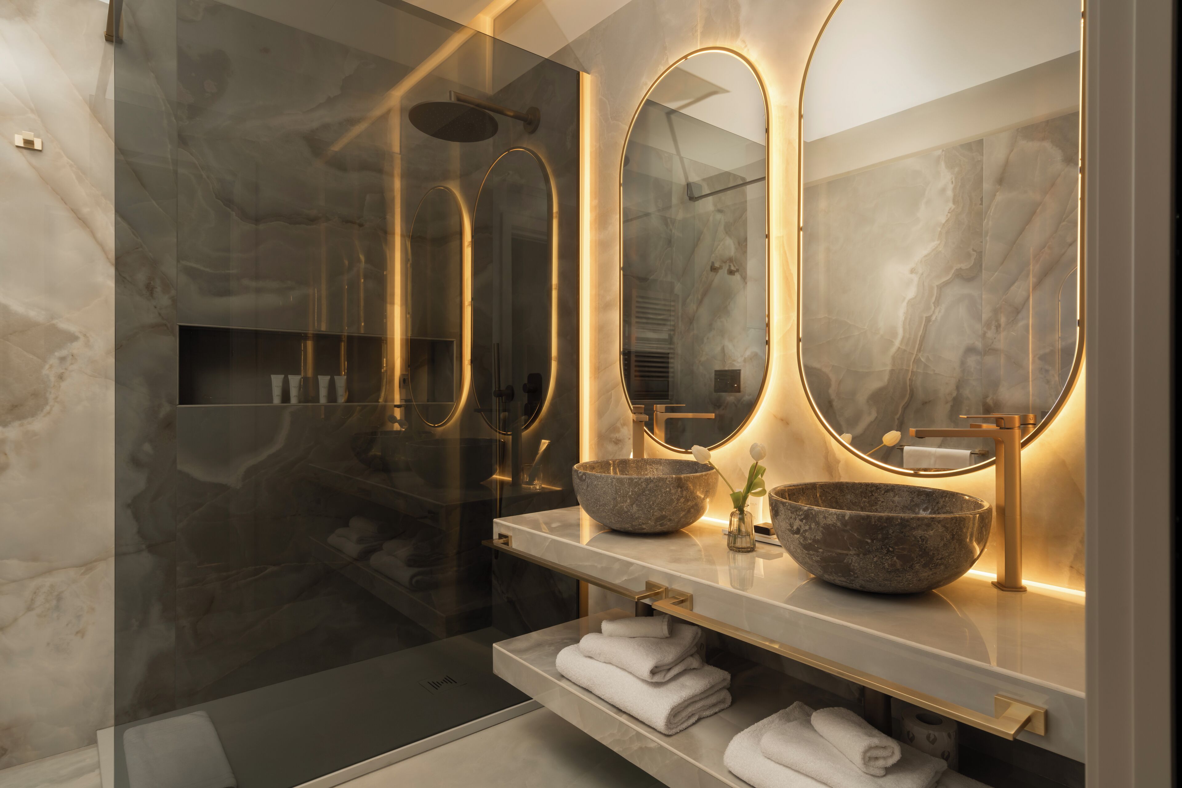 deluxe suite | bathroom | shower, designer toiletries, hair dryer, bathrobes