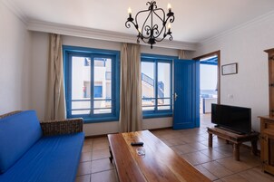 Superior Apartment, 2 Bedrooms | Living room | 22-inch plasma TV with satellite channels, TV