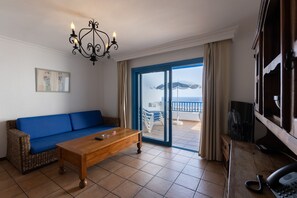 Superior Apartment, 2 Bedrooms | Living room | 22-inch plasma TV with satellite channels, TV