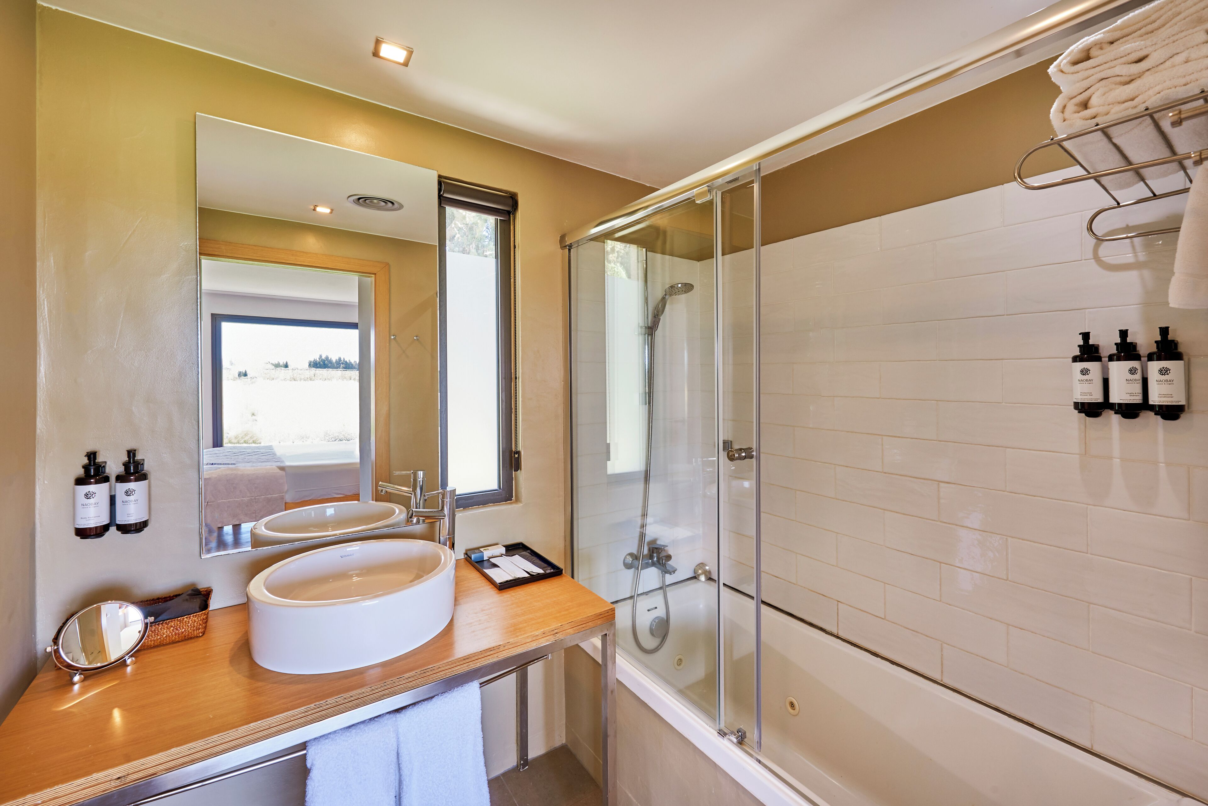 junior suite | bathroom | shower, rainfall showerhead, free toiletries, hair dryer