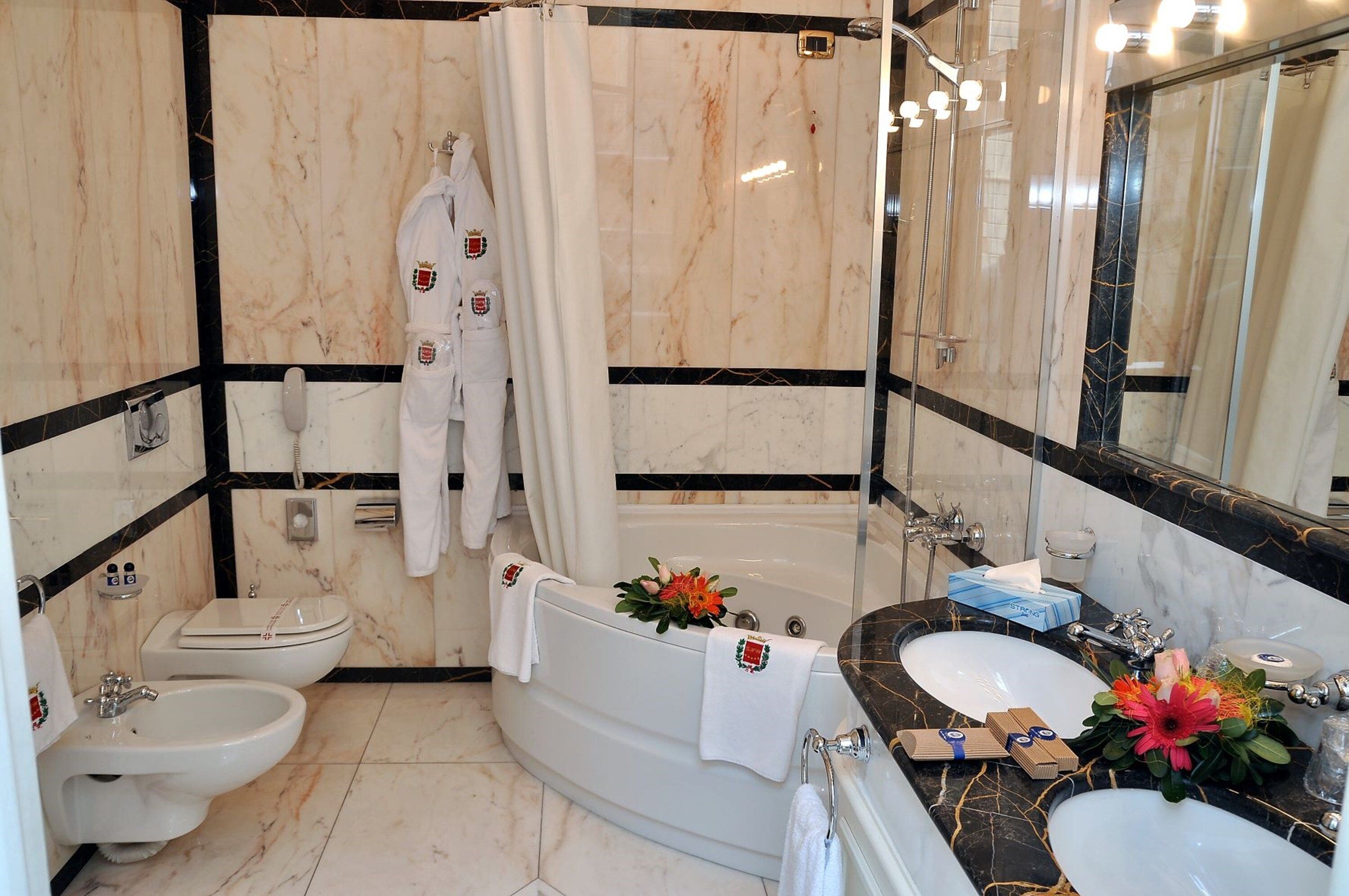 suite | bathroom | free toiletries, hair dryer, bathrobes, slippers