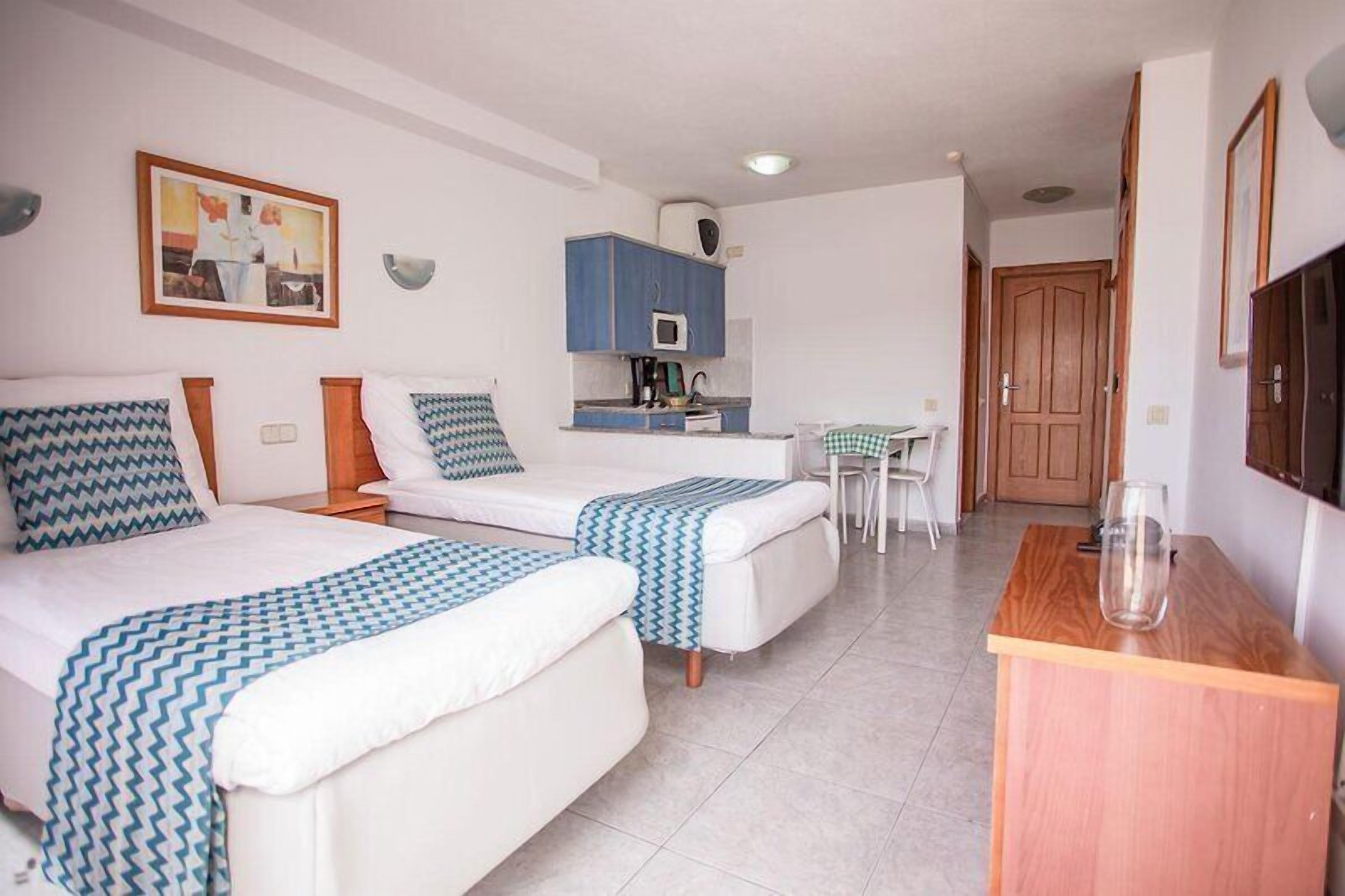 In-room safe, blackout drapes, WiFi (free), bed sheets
