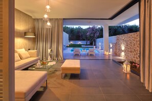 Executive Suite, Private Pool | Living area | Flat-screen TV - Caravia Beach Hotel & Bungalows - All Inclusive (Kos)