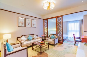 Suíte standard | Área de estar | TV LCD