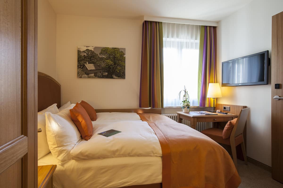 Literie hypoallergénique, couette en duvet d'oie, minibar