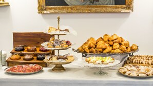 A buffet table with various pastries and desserts. - Hotel Leon D´Oro (Prague)