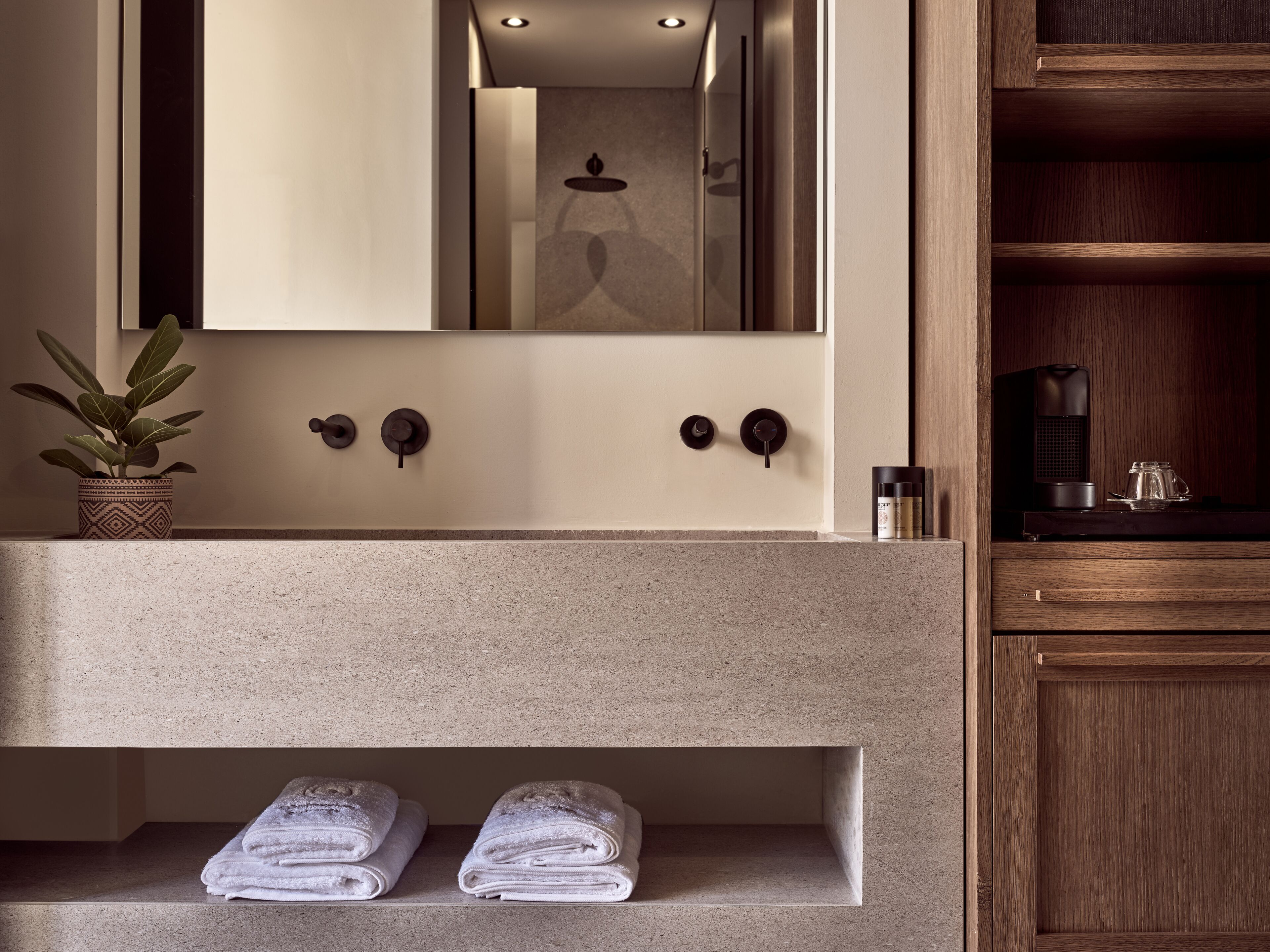 shower, designer toiletries, hair dryer, slippers