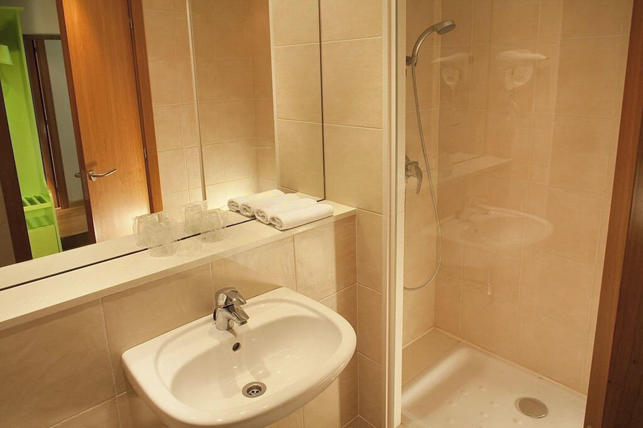 eco-friendly toiletries, hair dryer, towels, shampoo