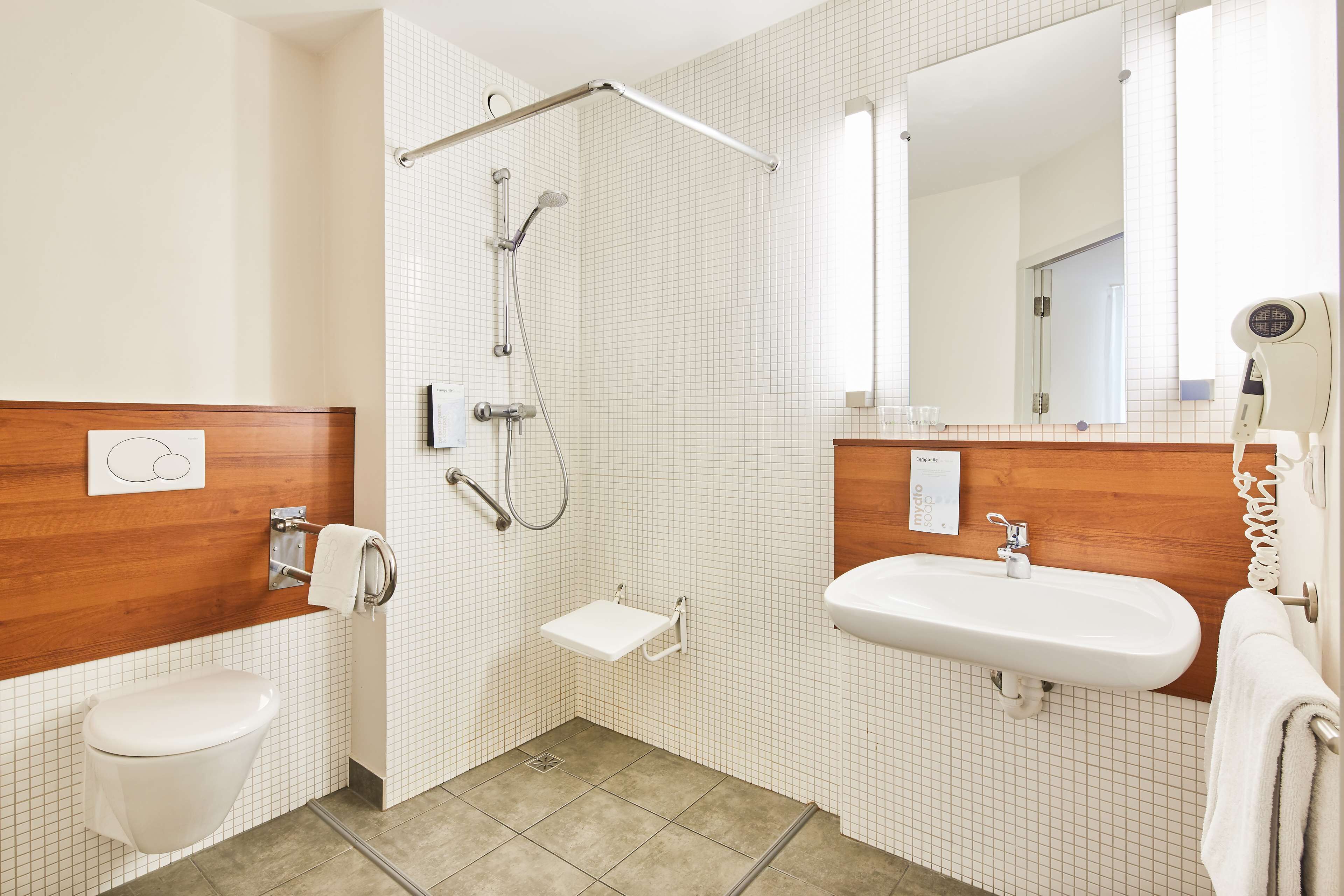 eco-friendly toiletries, hair dryer, towels, soap