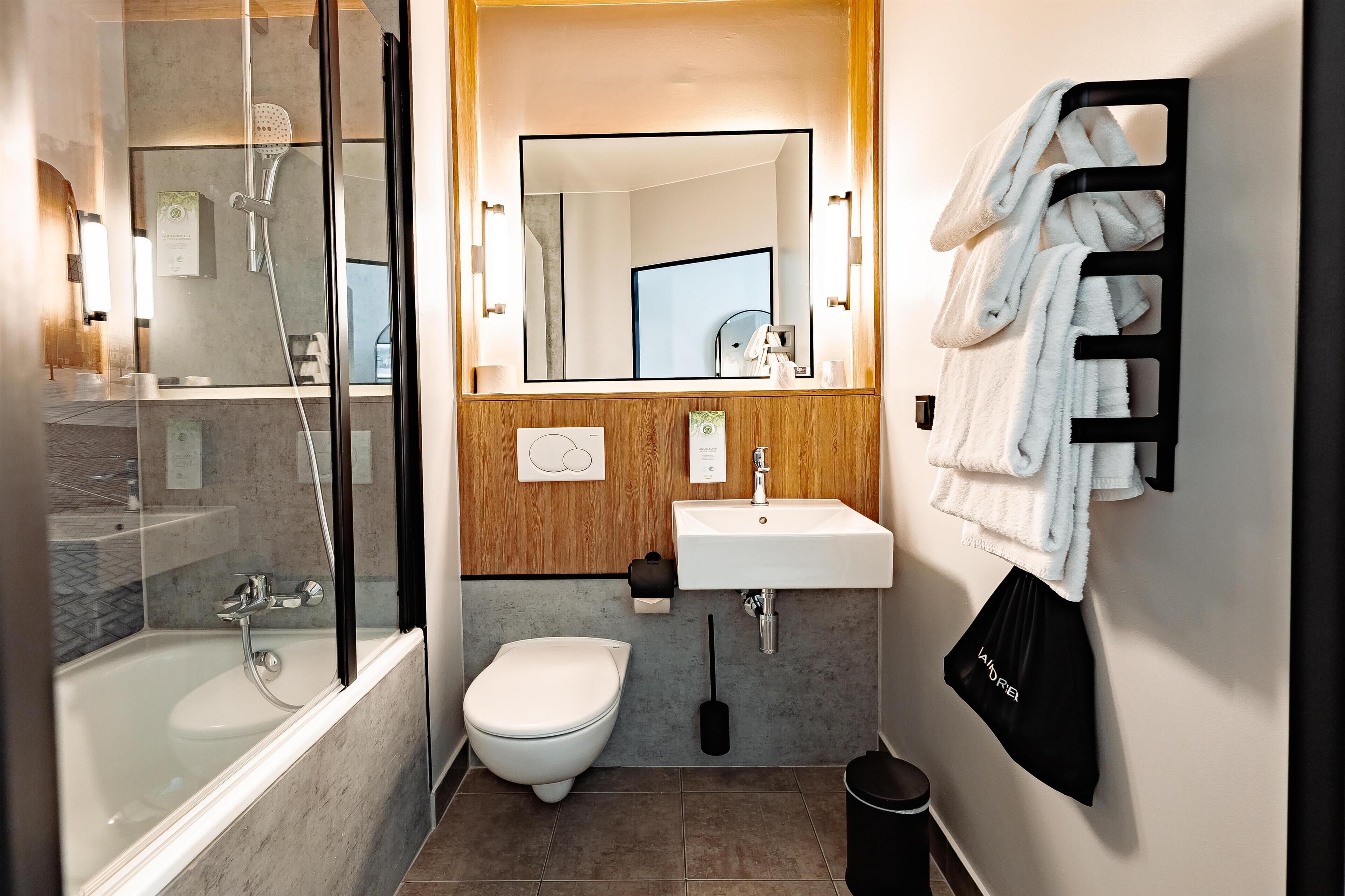 Eco-friendly toiletries, hair dryer, towels, soap
