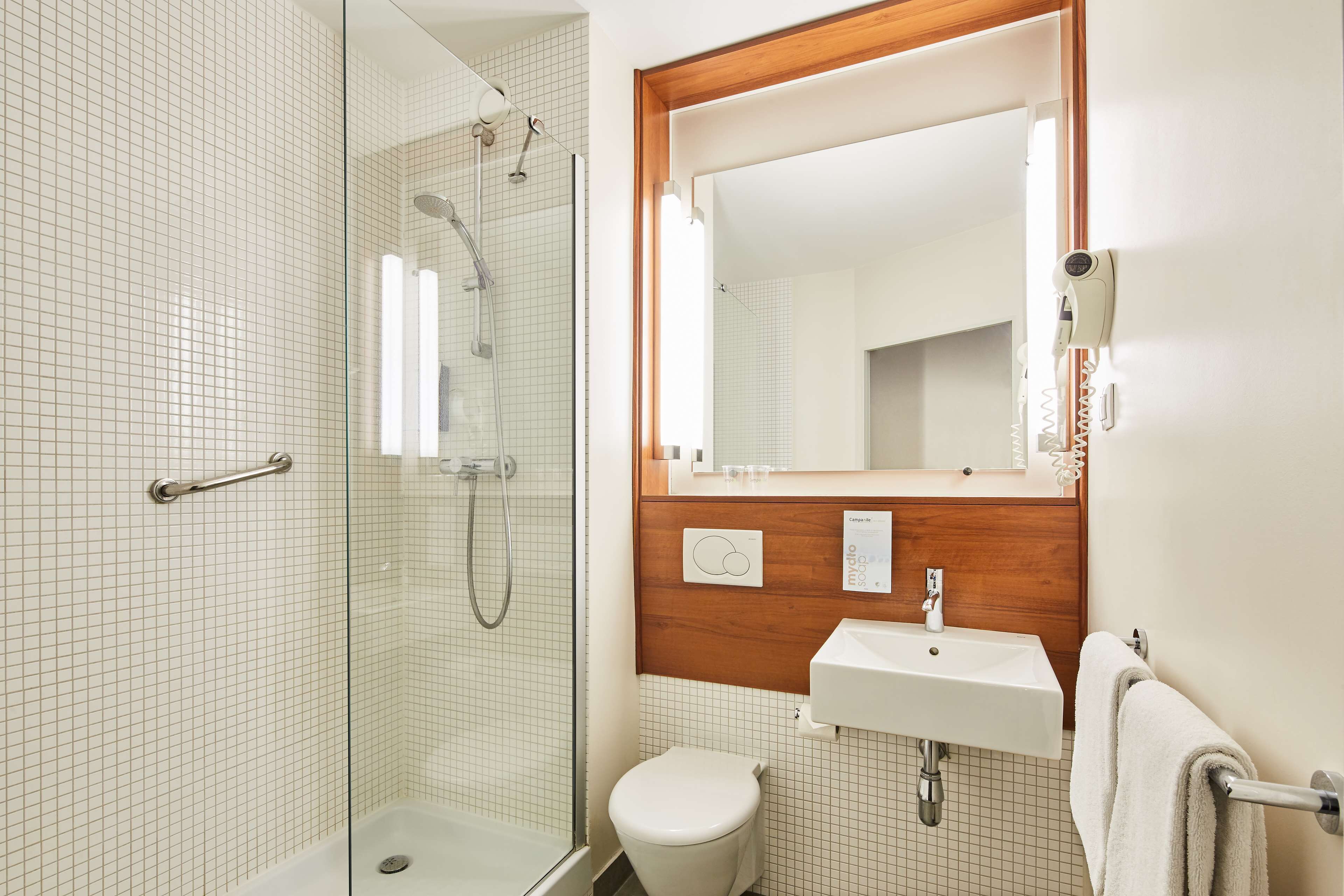 eco-friendly toiletries, hair dryer, towels, soap