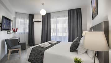 Superior Apartment, 3 Bedrooms, Balcony, City View | In-room safe, desk, soundproofing, free WiFi