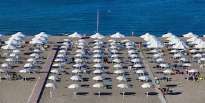 Private beach, sun loungers, beach umbrellas, beach bar