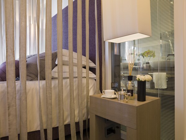 Standaard kamer | 1 slaapkamer, luxe beddengoed, een minibar, een kluis op de kamer