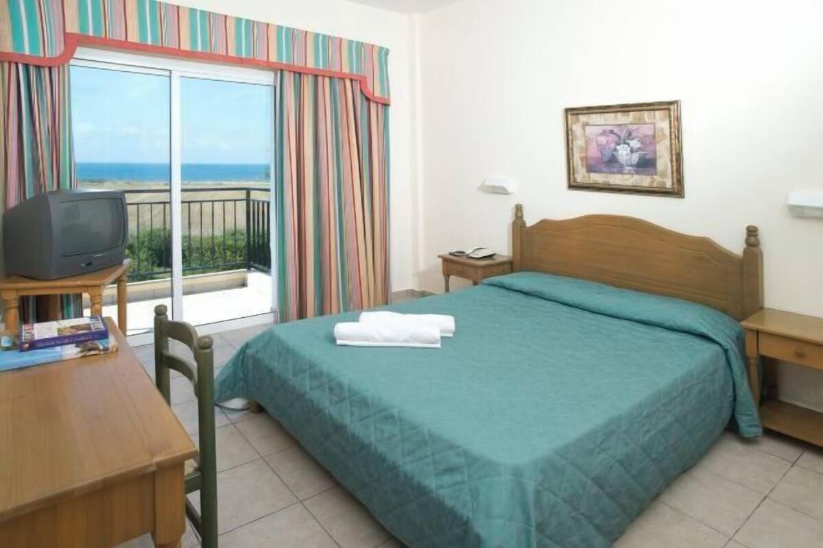 Blackout drapes, iron/ironing board (on request), cribs (free)