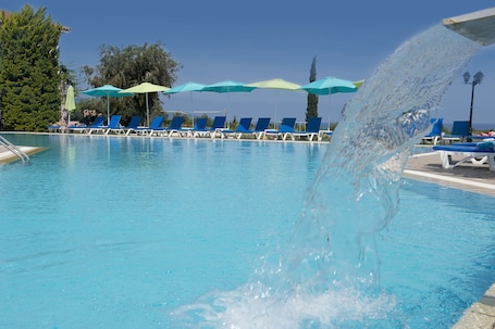 Indoor pool, outdoor pool, pool umbrellas, sun loungers