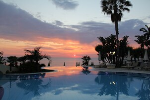 Outdoor pool, a rooftop pool, sun loungers