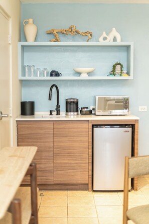 Suite, 1 King Bed, Non Smoking | Private kitchen | Coffee/tea maker