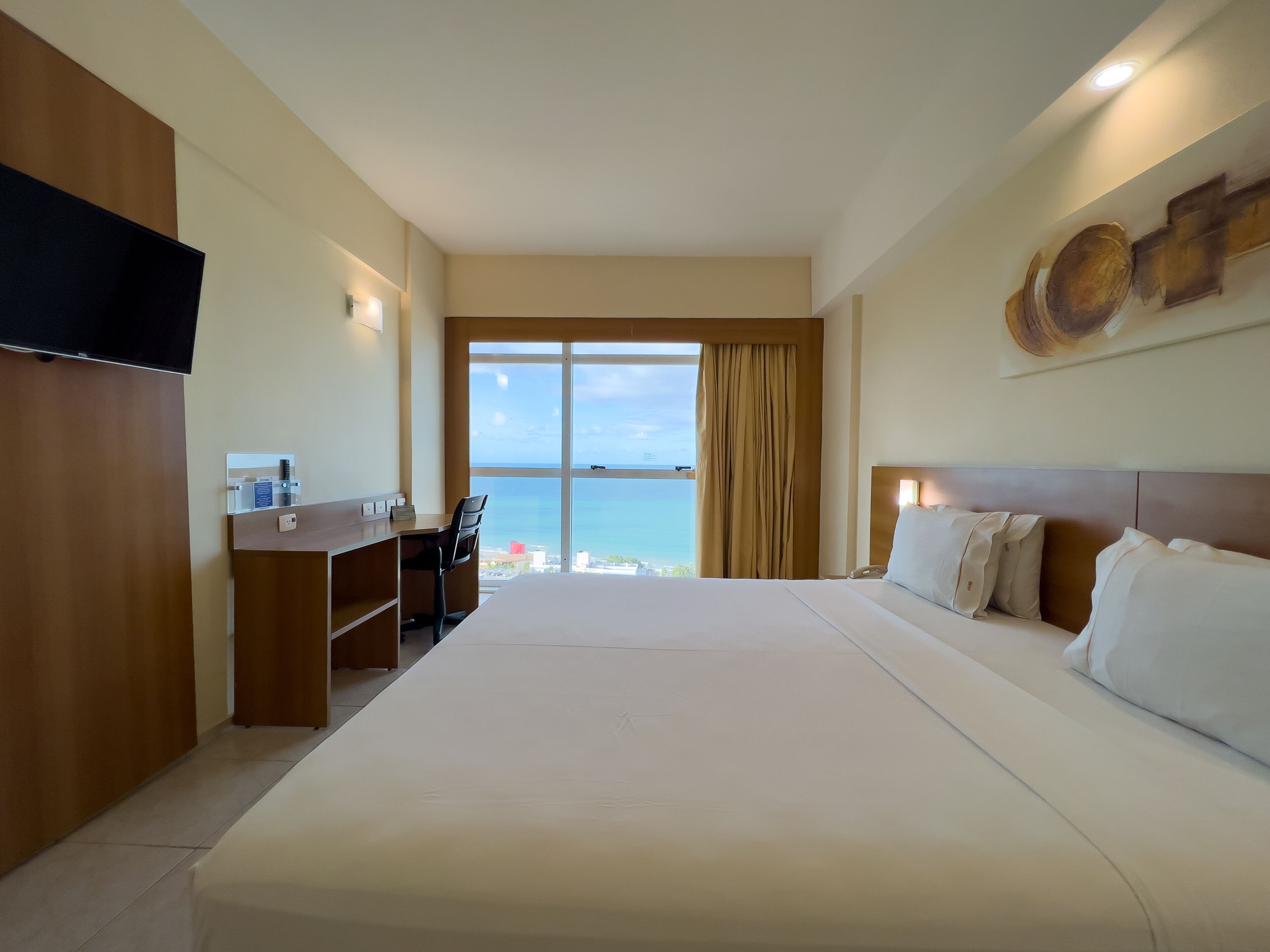 Superior Room, 1 King Bed, Sea View | Minibar, in-room safe, desk, blackout curtains