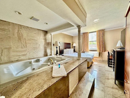 Basic Room, 1 King Bed, Jetted Tub | Select Comfort beds, iron/ironing board, free WiFi