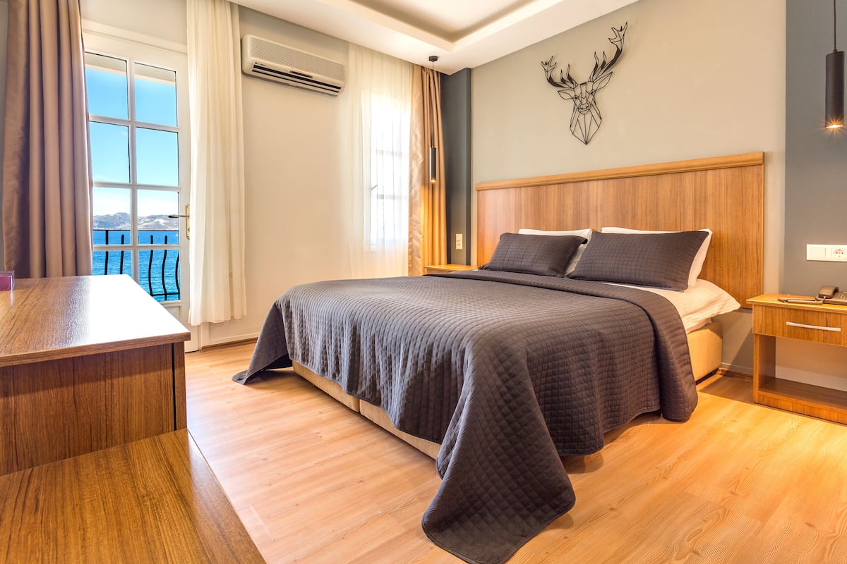Chambre Standard Double ou avec lits jumeaux, vue mer | Draps en coton égyptien, literie de qualité supérieure, minibar