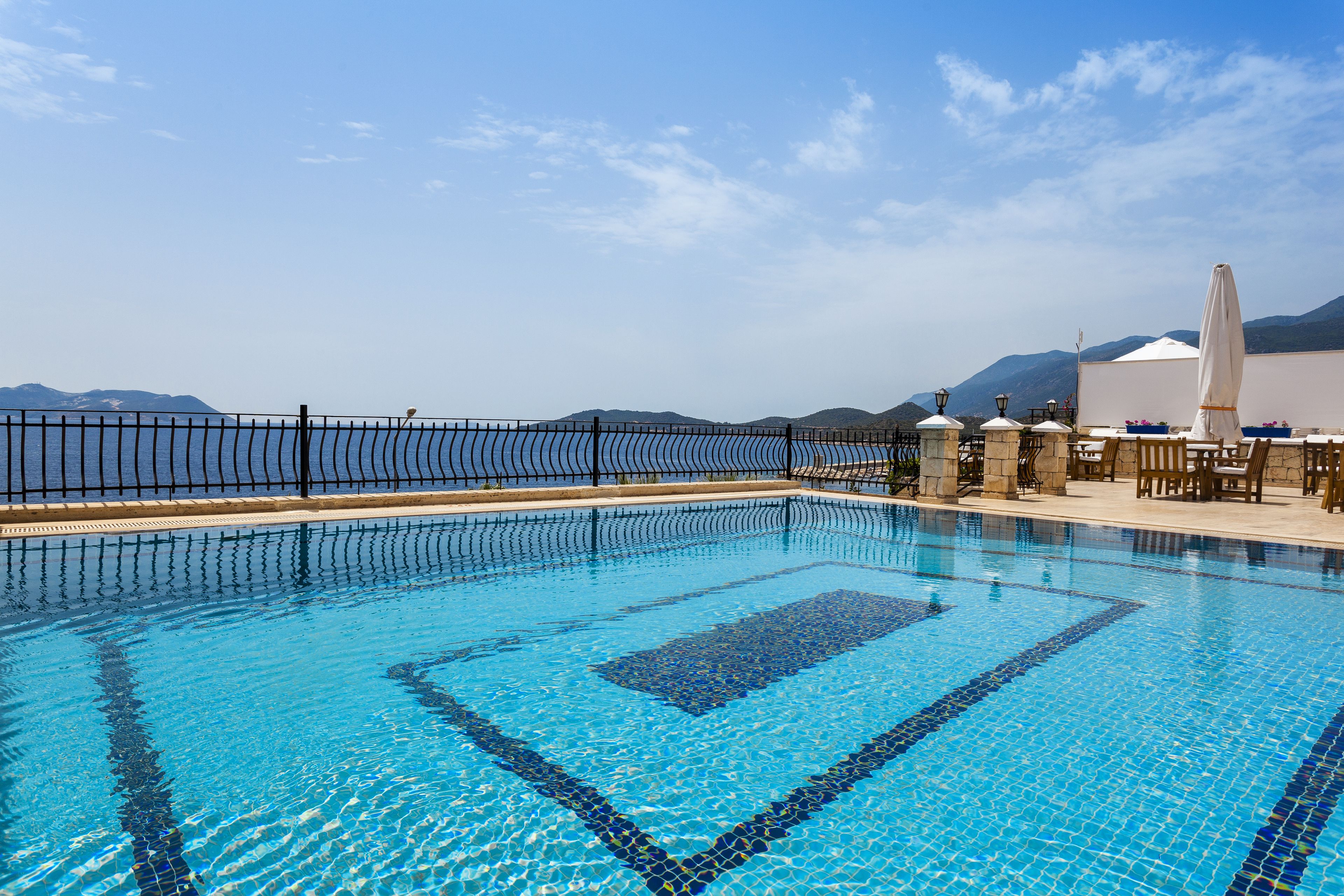 outdoor pool, pool umbrellas, pool loungers