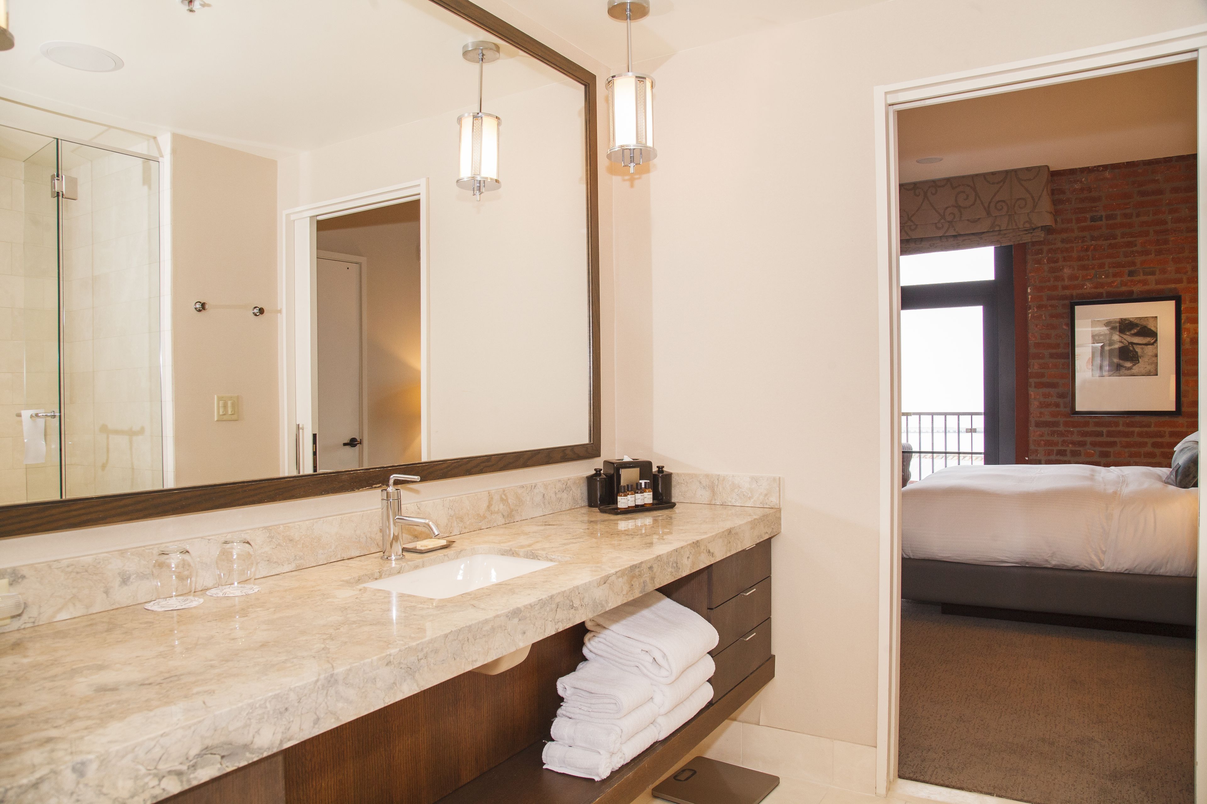 separate bathtub and shower, designer toiletries, hair dryer, bathrobes