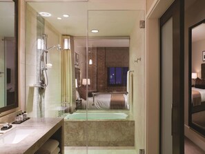 Separate bathtub and shower, designer toiletries, hair dryer, bathrobes