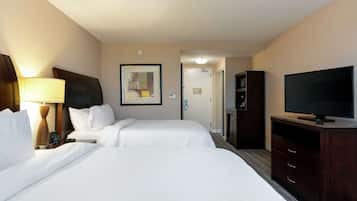 Two queens evolution room | Premium bedding, down comforters, desk, laptop workspace