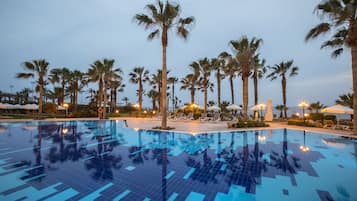 Indoor pool, outdoor pool, pool umbrellas, sun loungers