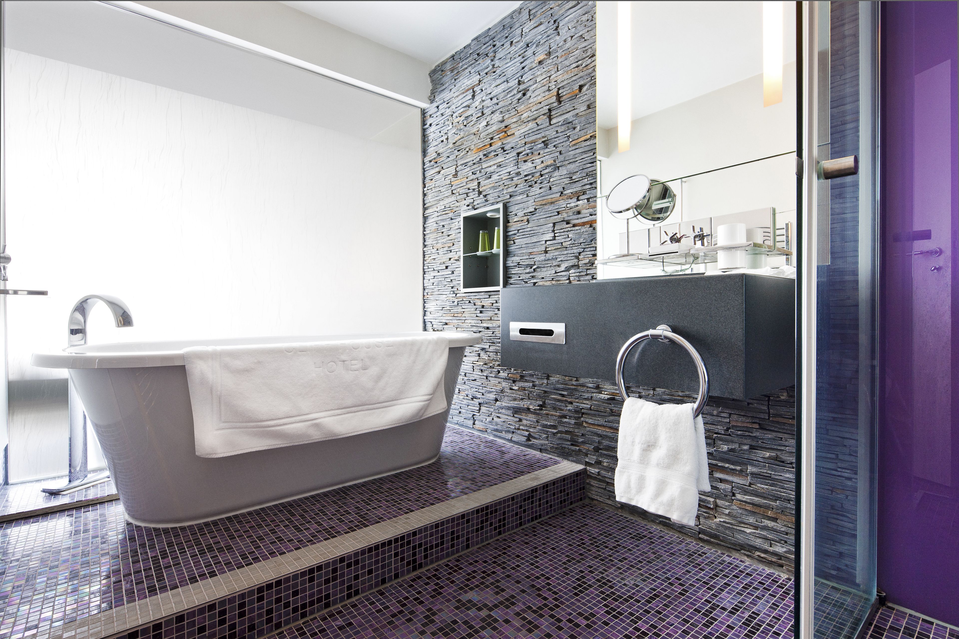 deluxe sea view room | bathroom | separate bathtub and shower, free toiletries, hair dryer, bathrobes