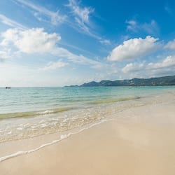 On the beach, beach umbrellas, beach towels, beach bar