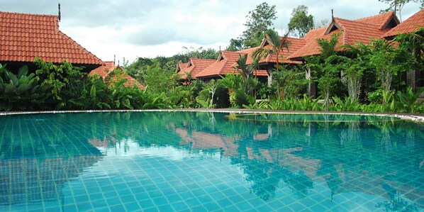 Outdoor pool, open 7:30 AM to 9:00 PM, pool umbrellas