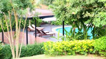Outdoor pool, open 7:30 AM to 9:00 PM, pool umbrellas