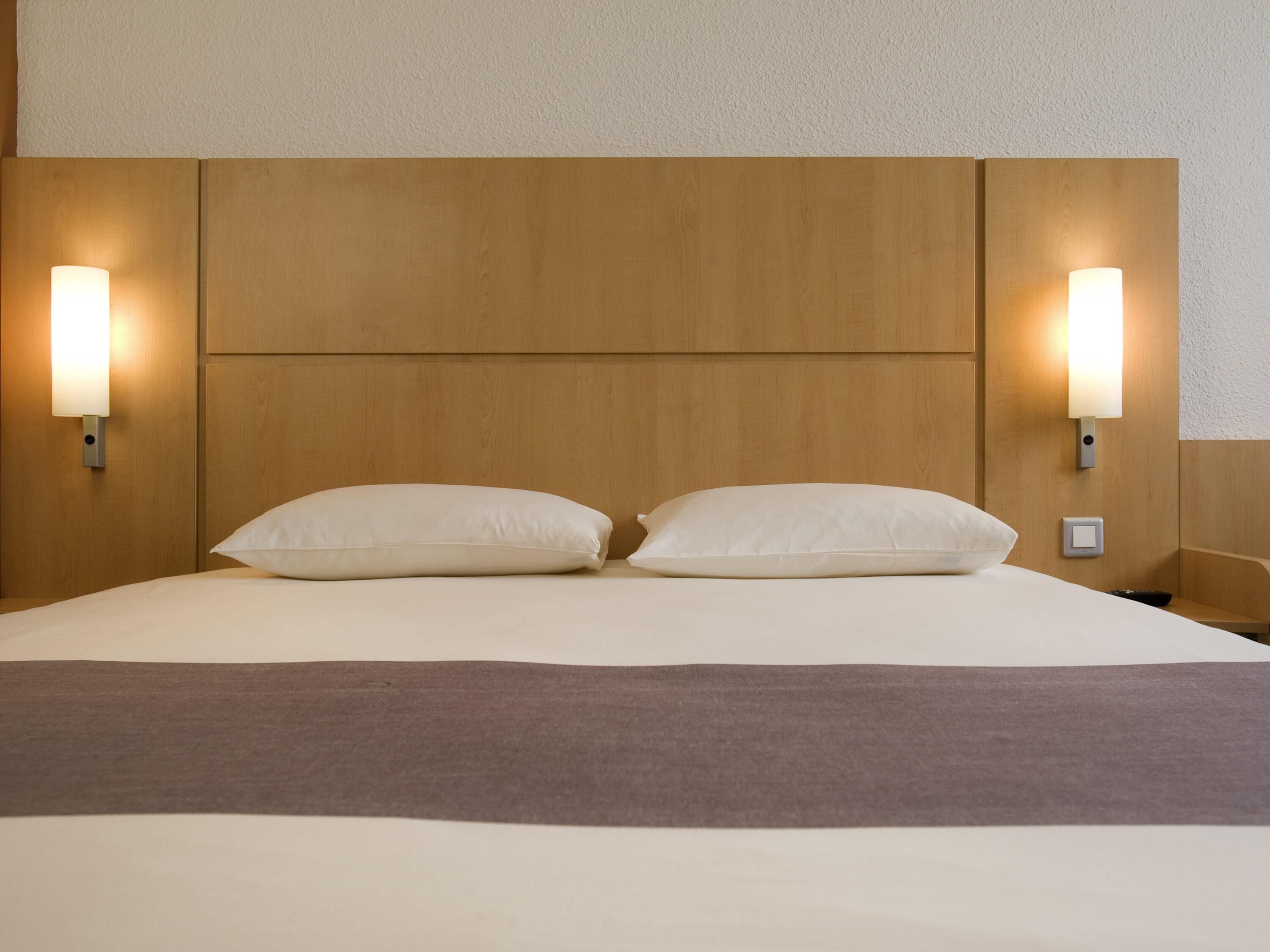 Premium bedding, down comforters, minibar, in-room safe