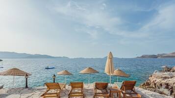 Private beach, sun loungers, beach umbrellas, beach towels