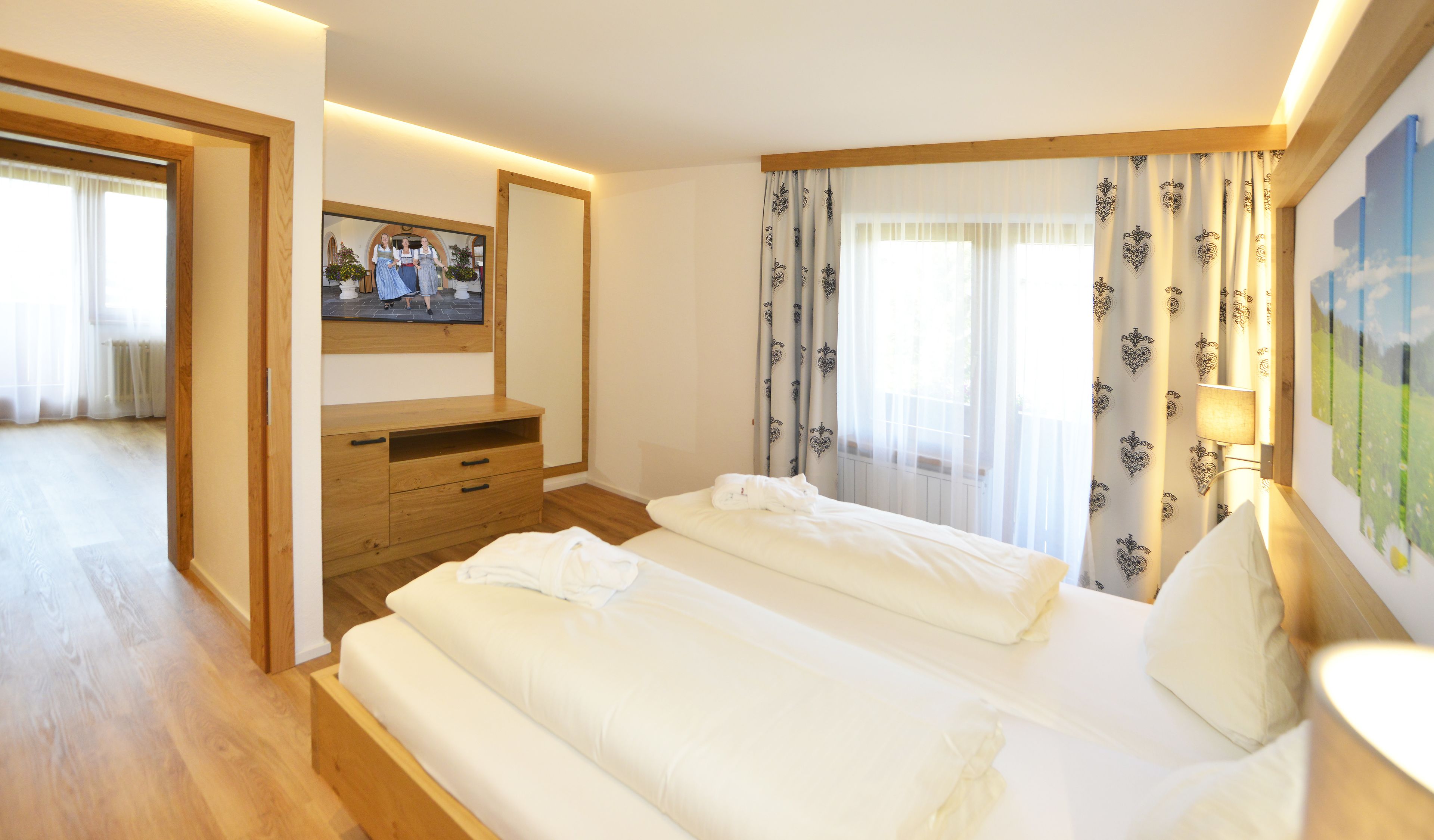 junior suite, 1 bedroom, garden area (seefeld) | 1 bedroom, hypo-allergenic bedding, down duvets, in-room safe